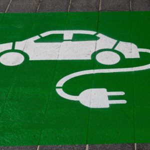 Painted sign on the ground for an electric car charging point