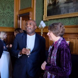A laughing David Lammy MP in conversation with Bishop Rachel