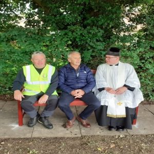 Paul Smyth, Stewart Wellman & Father Mark on the new donated bench.