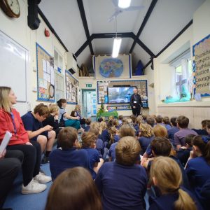 Archbishop Justin looks towards the cross reflectively