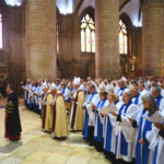 Clergy processing into the Nave of Gloucester Cathedral